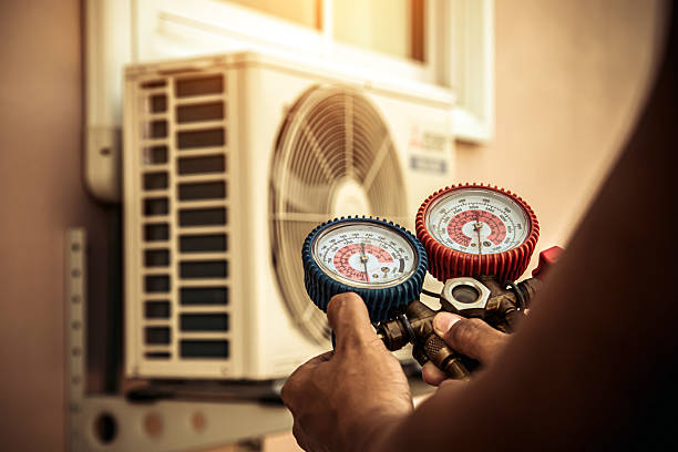 Professional Ductwork Repair technician working in Romance, AR